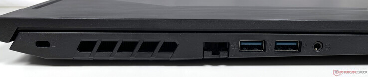 Lado izquierdo: Ranura de seguridad Kensington, puerto Gigabit Ethernet, dos puertos USB 3.2 Gen 1 Tipo-A, toma combinada de auriculares/micrófono
