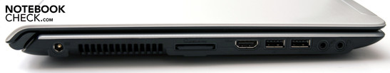 Lado Izquierdo: 2 USB, HDMI, lector de tarjetas, conector de poder, conectores de audio