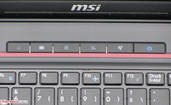 Cinco botones de función están situados cerca del botón de encendido (a la derecha)