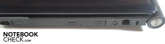 Derecha: USB 2.0, quemador de DVD, modem RJ-11, Seguro Kensington