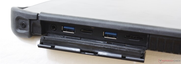 Derecha: audio combo de 3.5 mm, 2x USB 3.0 Tipo-A, lector MicroSD, ranura para Mini SIM
