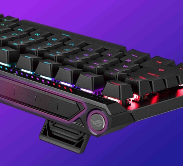 El botón multifunción y el panel táctil (rodeado en morado) son visibles.