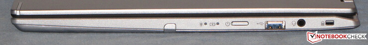 Lado derecho: botón de encendido, USB 3.2 Gen 1 (Tipo A), puerto combinado de audio, ranura para un cable de bloqueo