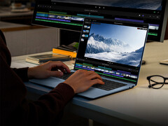El Book Pro 14 tiene un diseño delgado y ligero. En la foto: una imagen promocional que muestra al portátil manejando carga de trabajo de productividad.