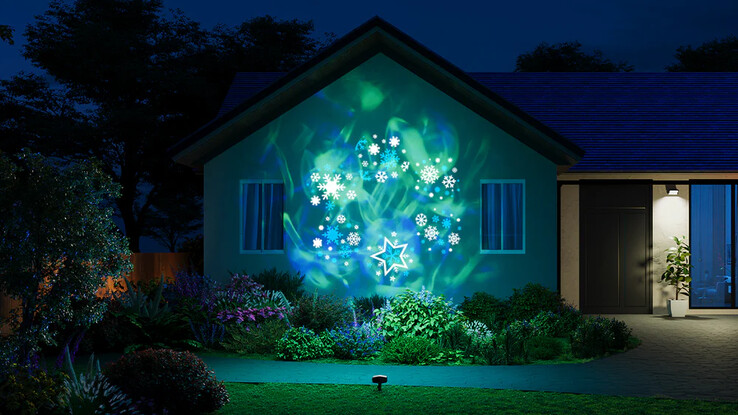 El proyector luminoso para decoración de exteriores Govee ofrece imágenes temáticas sobre un fondo de color. (Fuente de la imagen: Govee)