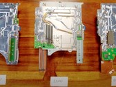 Placa base de PlayStation 5 modelo 1200 (en el centro) y sus predecesoras (Fuente: Austin Evans en YouTube)