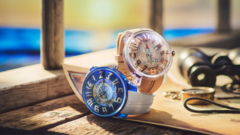 Dos relojes de edición limitada Tendence One Piece, Log Pose y East Blue, expuestos sobre un mapa náutico con la identidad de marca de la colaboración Batch N°2.