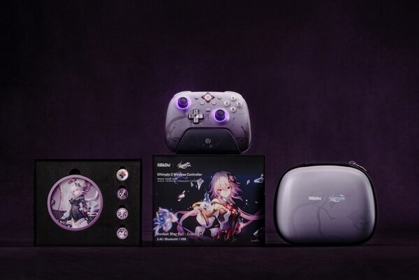 El mando inalámbrico 8BitDo Ultimate 2 (Honkai: Star Rail - Evernight) viene con regalos en la caja. (Fuente de la imagen: 8BitDo)