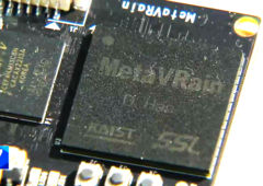 El chip MetaVRain es más pequeño que una moneda normal. (Fuente de la imagen: YouTube) 