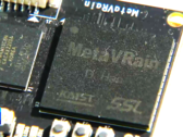 El chip MetaVRain es más pequeño que una moneda normal. (Fuente de la imagen: YouTube)