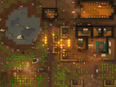 Captura de pantalla de RimWorld que muestra una colonia bajo ataque, con incendios, animales y edificios.