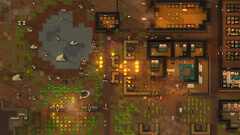 Captura de pantalla de RimWorld que muestra una colonia bajo ataque, con incendios, animales y edificios.