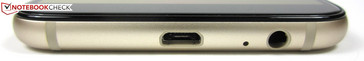 Lado inferior: Puerto para micrófono USB 2.0, toma de auriculares