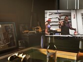 Una captura de pantalla del tráiler 2 de GTA VI mostrando un mando de PlayStation 4