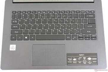 Diseño de teclado estándar con el botón de encendido en la esquina superior derecha. El lector de huellas dactilares es opcional