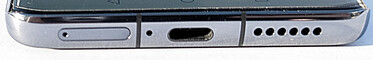 Parte inferior: Bandeja SIM, micrófono, puerto USB-C, altavoces