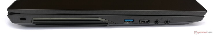 Lado izquierdo: Cerradura Kensington, 1x USB 3.2 Gen 1 Tipo-A, 1x USB 2.0 Tipo-A, 1x micrófono de 3.5 mm, 1x auriculares de 3.5 mm