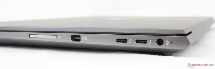 Derecha: Lector de tarjetas SD, Mini-DisplayPort 1.4, 2x USB-C con Thunderbolt 4 PD + DP, adaptador de CA