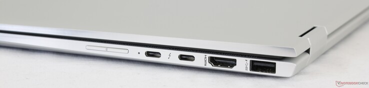 Cierto: Balancín de volumen, 2x USB Tipo C con Thunderbolt 3, HDMI 1.4, USB 3.1 Tipo A