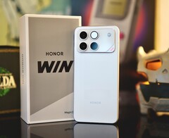 Un smartphone Honor Win de primera generación desplazado contra su caja.