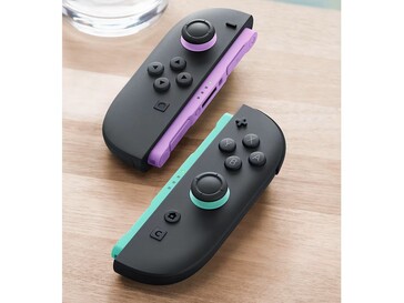 Los nuevos Joy-Cons tienen detalles en morado claro y verde claro en los raíles y los joysticks. (Fuente de la imagen: Nintendo)