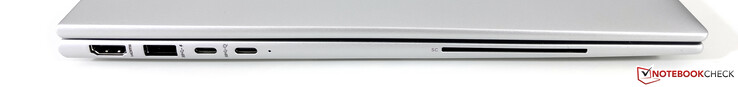 Izquierda: HDMI 2.0b, USB-A 3.2 Gen.1 (5 GBit/s) 2x USB-C 4.0 (40 GBit/s, DisplayPort ALT modo 1.4, Power Delivery), lector SmartCard (opcional)