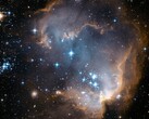 Hubble image of a star forming region in the Small Magellanic Cloud ( NASA Hubble Space Telescope via Unsplash; cropped)