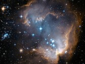 Hubble image of a star forming region in the Small Magellanic Cloud ( NASA Hubble Space Telescope via Unsplash; cropped)