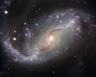 Una imagen que muestra la galaxia NGC 1672 y las estrellas del universo. (Fuente de la imagen: WikiImages - Pixabay)