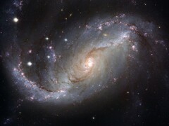Una imagen que muestra la galaxia NGC 1672 y las estrellas del universo. (Fuente de la imagen: WikiImages - Pixabay)