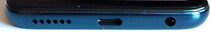 En la parte de abajo: Altavoz, puerto USB tipo C, conector de 3,5 mm