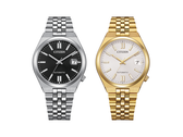 El modelo Citizen NK0030-51E, con esfera negra, y el modelo NK0032-56A en tono dorado, que se muestra en la imagen.