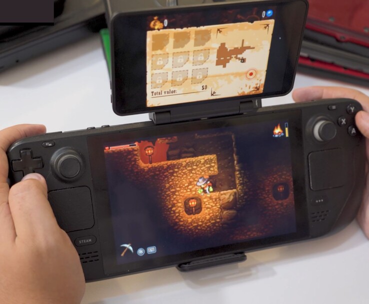 Steam Deck emparejado con la pantalla dual de Retroid mostrando la jugabilidad de SteamWorld Dig en la pantalla principal y el mapa del juego en la pantalla secundaria. (Fuente de la imagen: GameXData vía YouTube)
