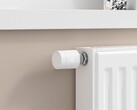 Termostato de radiador Aqara W600 instalado en un radiador blanco (Fuente de la imagen: Aqara)