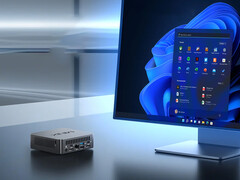 El NUC150 puede equiparse con el Intel N150 o el Core 3 N355. En la imagen: una imagen promocional del mini PC sentado junto a un monitor. (Fuente de la imagen: Minix)