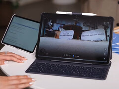 La Redmi Pad 2 Pro con su accesorio de teclado desmontable y el Redmi Smart Pen. (Fuente de la imagen: Xiaomi)