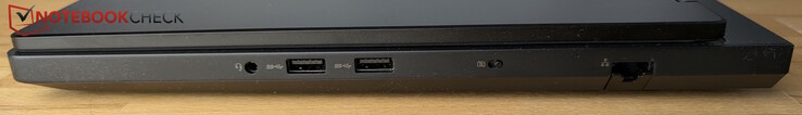 Derecha: toma de auriculares de 3,5 mm, 2× USB-A (5 Gbps), obturador de cámara web, LAN