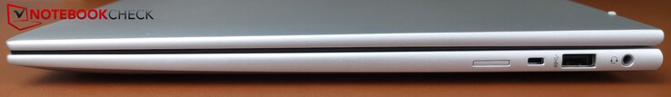 Derecha: Ranura para tarjeta SIM, ranura Kensington, USB-A (5 Gbps), toma de auriculares de 3,5 mm