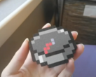 La brújula DIY de Minecraft impresa en 3D (en la imagen). (Fuente de la imagen: u/Intelligent-Cause751 vía r/minecraft)