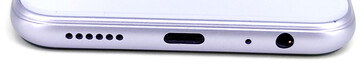 Parte inferior: Altavoz, puerto USB-C, micrófono, conector de audio de 3,5 mm