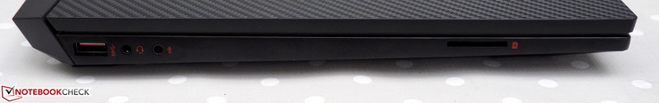 Lado izquierdo: USB 3.1 Gen1 Tipo A, conector de auriculares de 3.5 mm, conector de micrófono de 3.5 mm, lector de tarjetas SD
