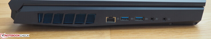 Izquierda: RJ45-LAN, 2x USB-A 3.1 Gen2, micrófono, auriculares