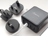 Cargador USB BMX GaNSTA de 140 W con adaptadores de CA para todo el mundo.