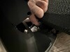 Conexión por cable entre el respaldo y el asiento