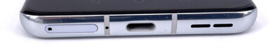 Parte inferior: Ranura SIM, micrófono, puerto USB-C, altavoz