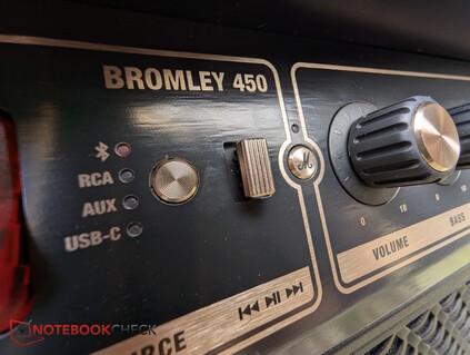 Botón de fuente y conmutador de medios