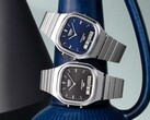 Los relojes retro analógico-digitales Casio AQ-240E-1A y AQ-240E-2A2, con esferas negras y azules con efecto rayos de sol, respectivamente, se muestran uno al lado del otro.