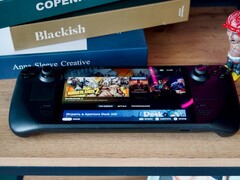 Un dispositivo Steam Deck sobre una mesa (Fuente de la imagen: Georgiy Lyamin vía Unsplash)