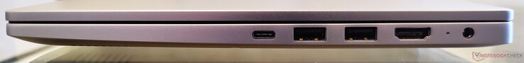 Derecha: USB 3.1 Gen1 Tipo-C, 2 USB 3.1 Gen1 Tipo-A, salida HDMI 1.4b, indicador de alimentación, puerto de carga