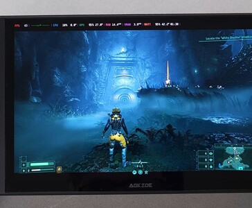 Returnal ejecutándose en la consola portátil AMD Ryzen AI 9 HX 370, mostrando en pantalla un benchmark de rendimiento en el juego. (Fuente de la imagen: The Phawx)